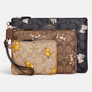 Coach Pouch Trio in Signature Canvas with Happy Dog, Dancing Kitten, & Chick